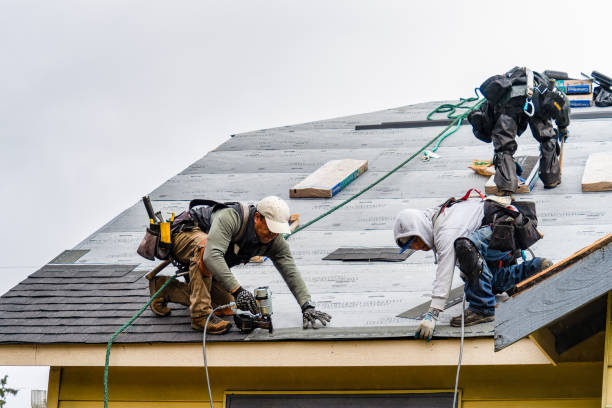 Professional Gutter Installation technician working in Bally, PA